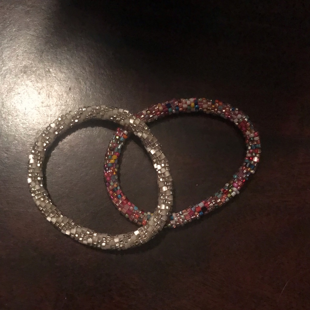 White And Multi Colored Lily And Laura Bracelets 10$